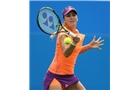 EASTBOURNE, ENGLAND - JUNE 14: Belinda Bencic of Switzerland plays a forehand against Naomi Broady of Great Britain during their Women's Singles first round qualifying match on day one of the Aegon International at Devonshire Park on June 14, 2014 in Eastbourne, England.  (Photo by Steve Bardens/Getty Images)